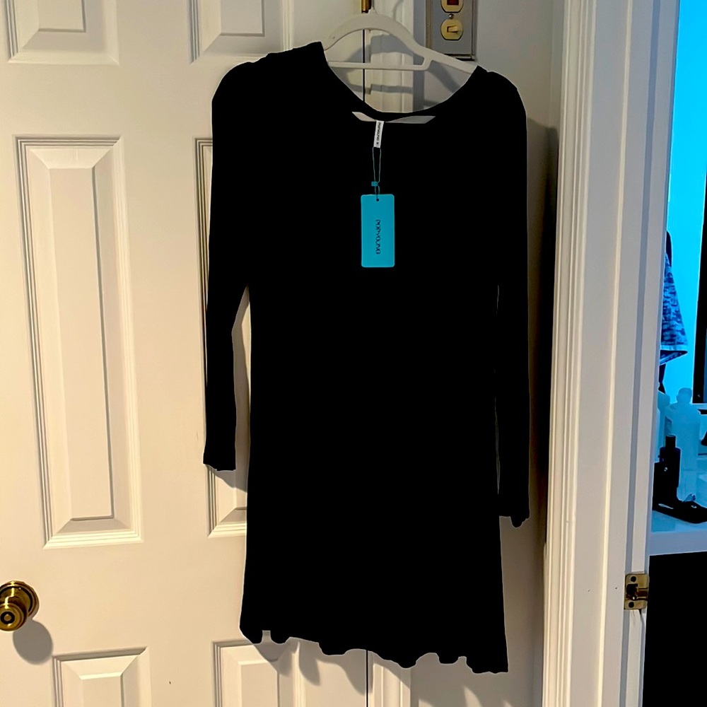 A black dress, medium, very soft fabric. Brand is popyoung, brand new.